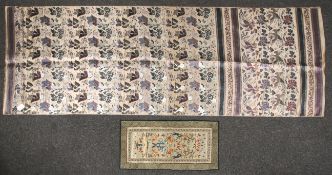 A 20th century Chinese silk embroidery panel and a length of silk.