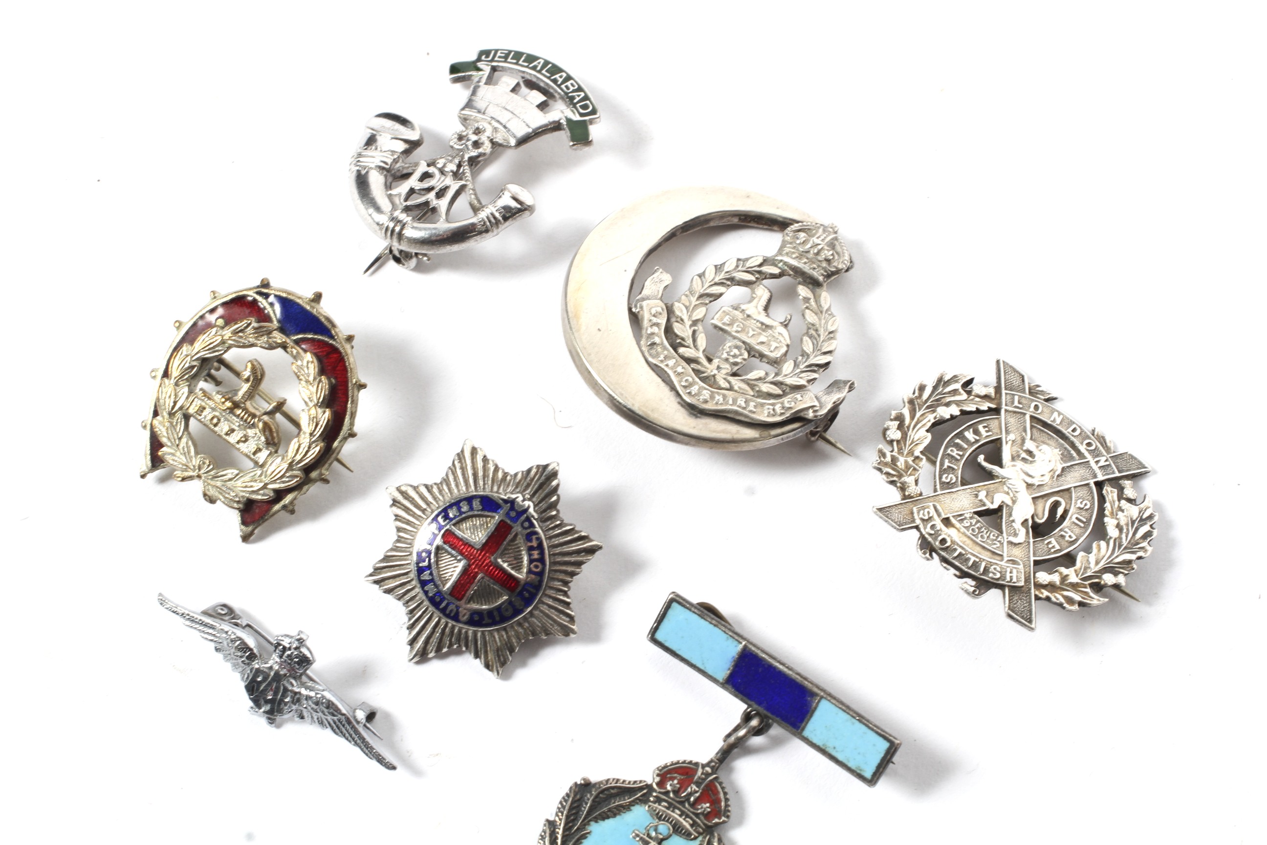 Seven silver and white metal enamel WWI and WWII sweetheart brooches. Including East Lancashire Reg. - Image 2 of 2