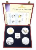 A collection of four Titanic cu silver plated medallions. 137g and 70mm diameter, boxed.