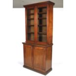 A late Victorian glazed bookcase.