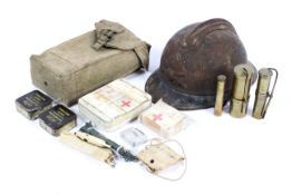 A British Army post war web pouch with contents, WWI French helmet and other collectables.