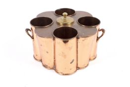 An unusual late 19th/early 20th century copper and brass wine cooler.