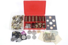 A box of assorted coins and bank notes