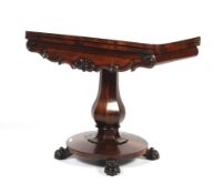 A Victorian rosewood card table.