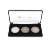 Three Victorian crown coins, from 1847 (cleaned), 1892 and 1893. Boxed.