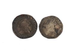 Two Elizabeth I shillings.