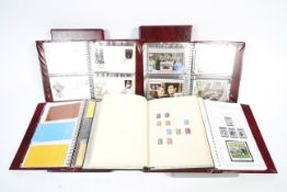 Five boxed albums of assorted stamps and covers including Royal events