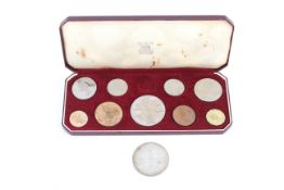 A 1953 proof set of coins in a box and a Southern Rhodesia crown