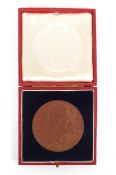 An 1897 Diamond Jubilee large bronze medallion in a red box