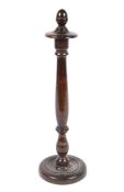 An early 20th century stained elm turned barrister's wig stand.