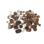 An assortment of English and world coins,