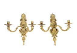 A pair of early 20th century gilt metal wall sconces.