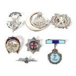 Seven silver and white metal enamel WWI and WWII sweetheart brooches. Including East Lancashire Reg.