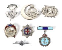 Seven silver and white metal enamel WWI and WWII sweetheart brooches. Including East Lancashire Reg.