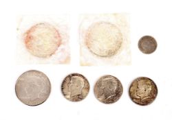 Six silver coins.