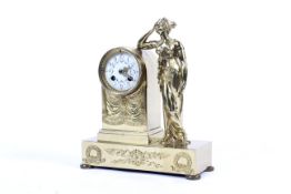 An early 20th century brass mantel clock.