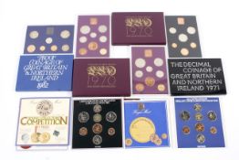 Four proof sets of coins and two Brilliant uncirculated sets.