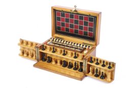 A wooden boxed compendium of games, perhaps by FH Ayres, late Victorian or Edwardian.