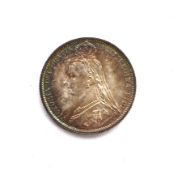 An 1888 sixpence coin