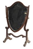 A Regency mahogany shield shaped dressing table mirror.