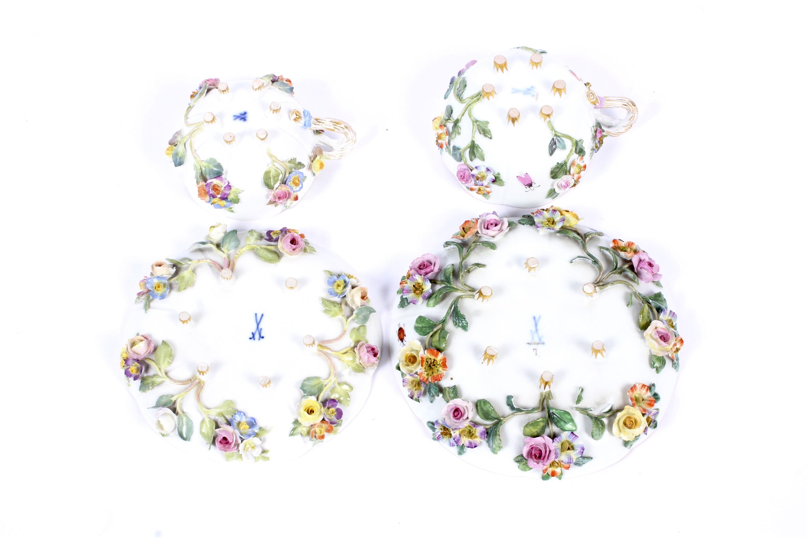 Two late 19th century Meissen flower encrusted teacups and saucers. - Image 3 of 3