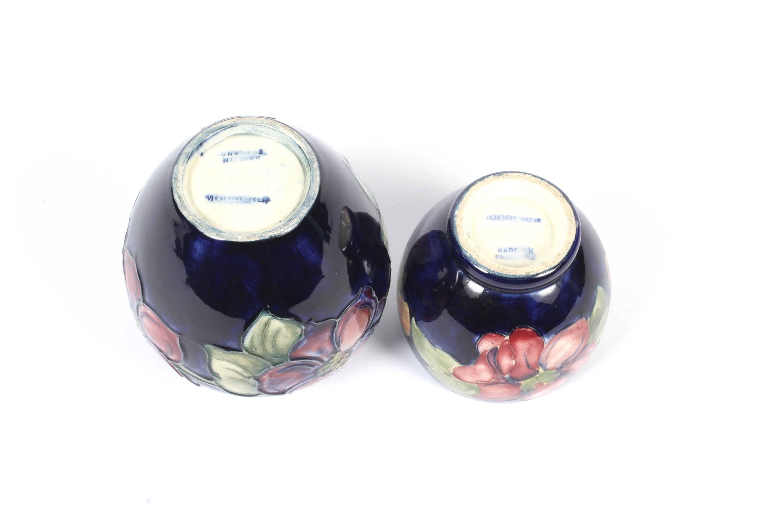 Two mid-20th century Moorcroft blue-ground Anemone pattern vases. Impressed marks, - Image 2 of 2