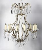 A Labadie chandelier with two tiers issuing 12 lights, retailed by Vaughan Lighting.