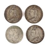 Four 19th century crown coins.