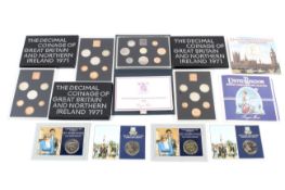 Four proof coin sets, two Billiant uncirculated sets and four nickel coins.