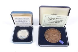 A large Battle of Waterloo medallion and a 1981 silver proof crown coin