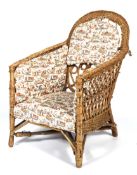 A bamboo and wicker framed conservatory chair with drop-in chinoiserie pattern cushions.