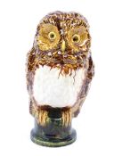 A large Chelsea pottery glazed owl.