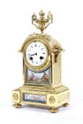 A gilt-metal and Sevres-style porcelain mounted mantel clock, circa 1900.