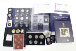 A group of modern coins and change checker albums, etc.