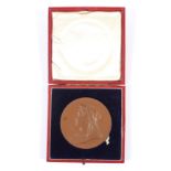 An 1897 Diamond Jubilee bronze medallion in a red case