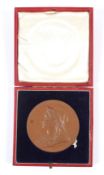 An 1897 Diamond Jubilee bronze medallion in a red case