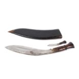 A vintage Nepalese Kukri knife and leather sheath.