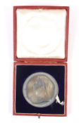 An 1897 Diamond Jubilee large silver medallion in a red case