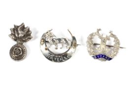 Three silver and white metal military sweetheart brooches.