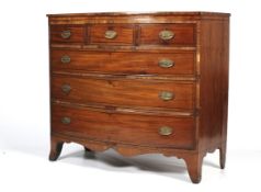 An early 19th century mahogany chest of drawers.