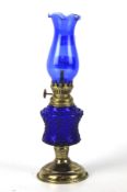 A miniature oil lamp.
