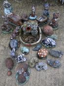 Twenty-four assorted vintage garden ornaments.