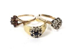 Three 9ct gold cluster rings.