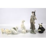 An assortment of 20th century porcelain figures.