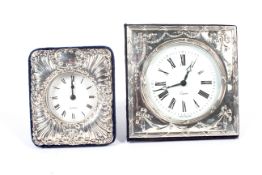Two contemporary silver fronted desk clocks.