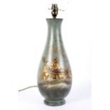 A vintage chinoiserie lacquered wooden table lamp.