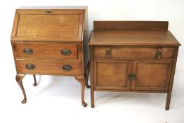 An oak bureau and cabinet.