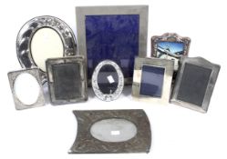 Assorted silver plated and white metal picture frames.
