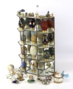 A collection of ornamental eggs eggs with stand and other collectables.