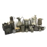 An assortment of metalware. Including pewter tankards, a miners lamp, steins, etc.